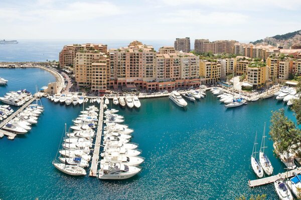 Pier in Monaco on the background of apartments