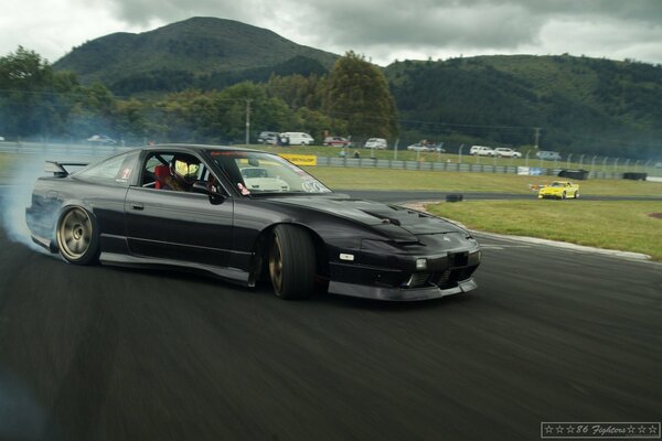 Mazda drifts and slides at high speed