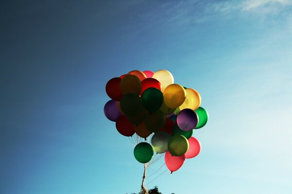 Rainbow balloons in the sky