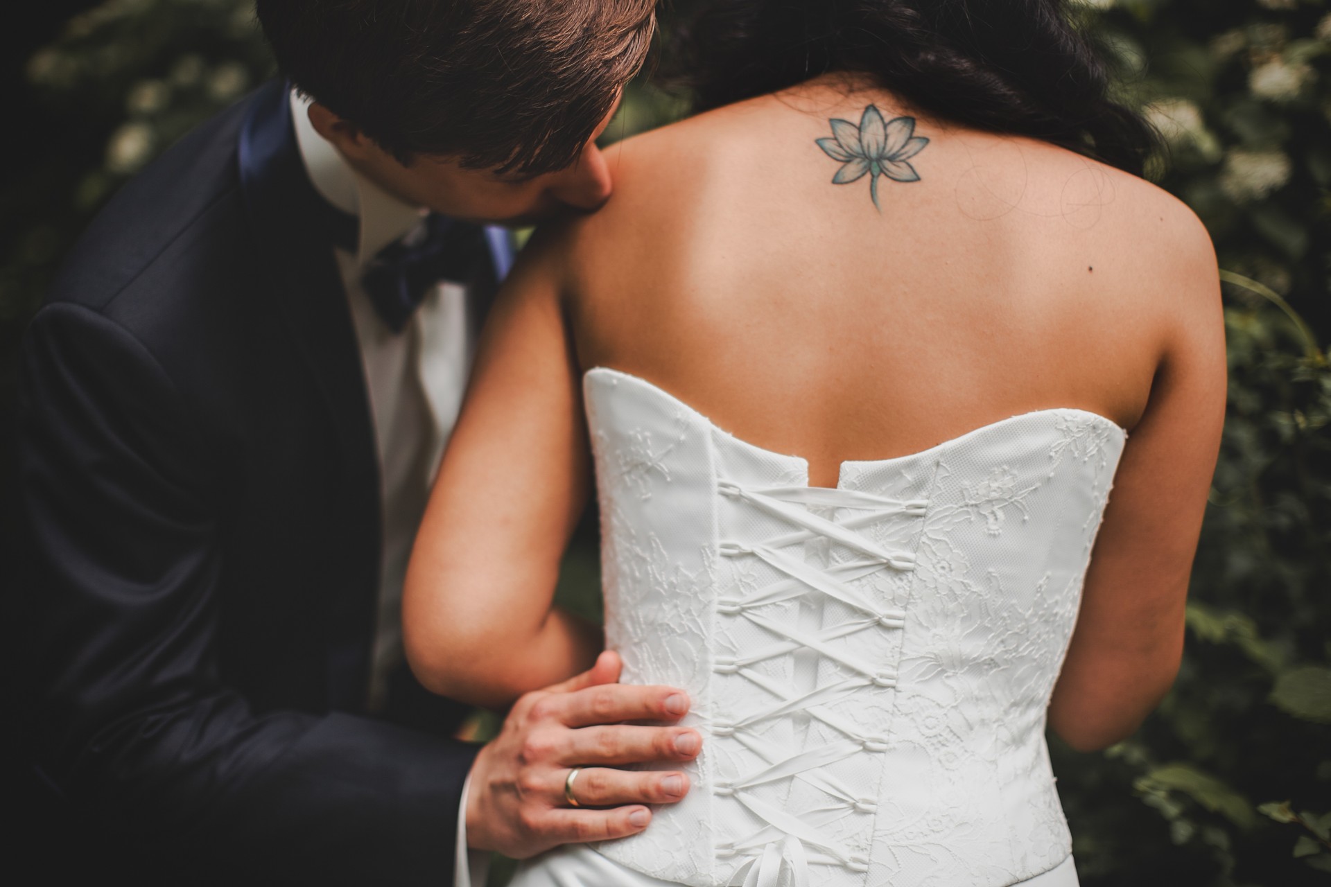 bride kiss ago tattoos groom