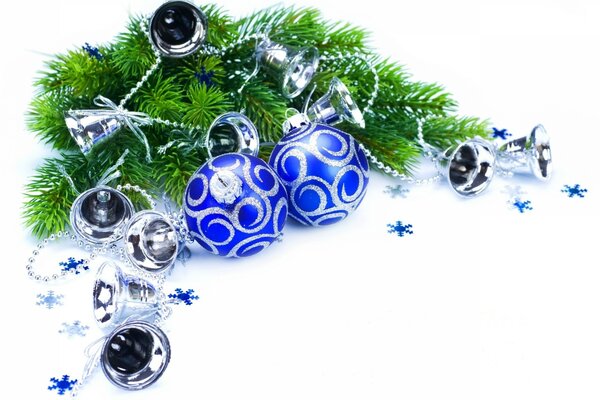 Christmas tree branches with bells and balls