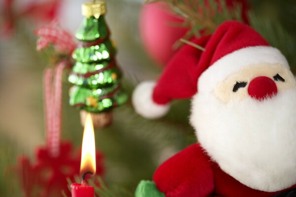 Santa Claus near the candle