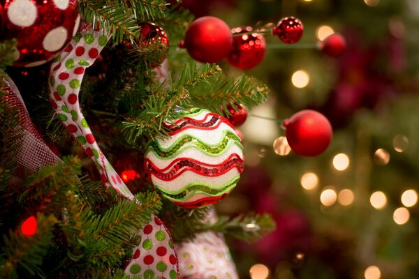 Bright Christmas balls on spruce branches