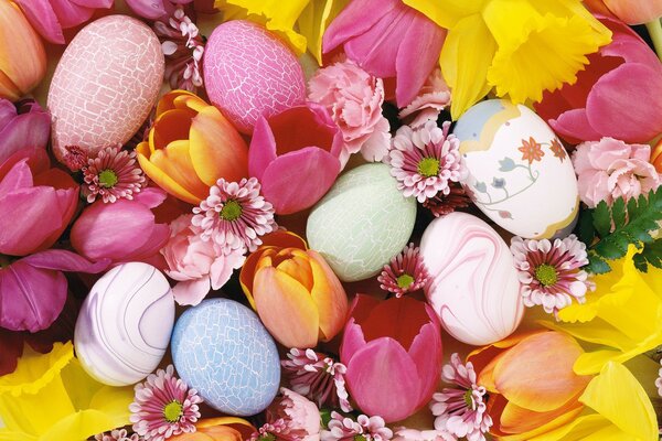 Easter eggs in colorful tulips