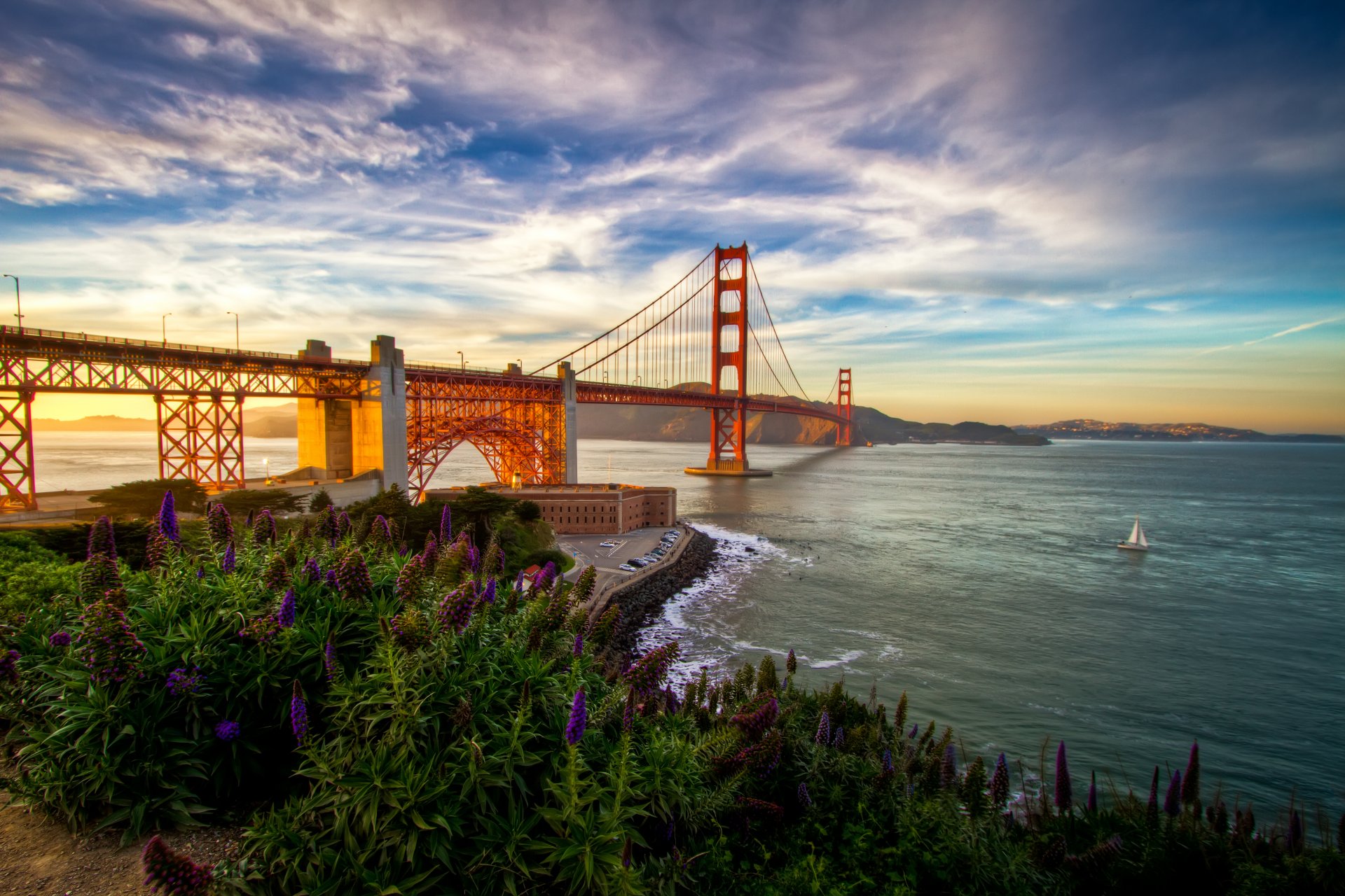 paesaggio natura ponte mare cielo nuvole montagne fiori erba tramonto onde barca