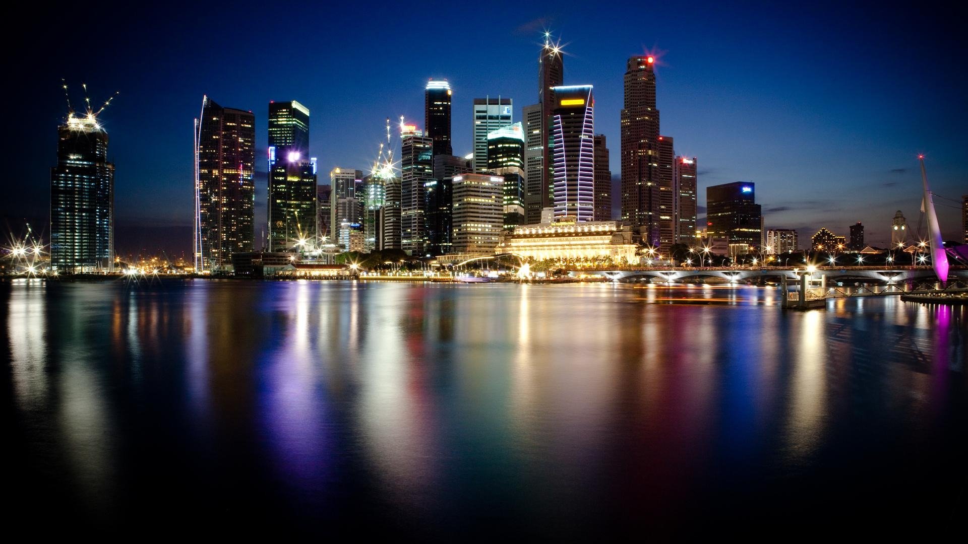 ingapore night town metropolis skyscraper lights water reflection photo wallpaper