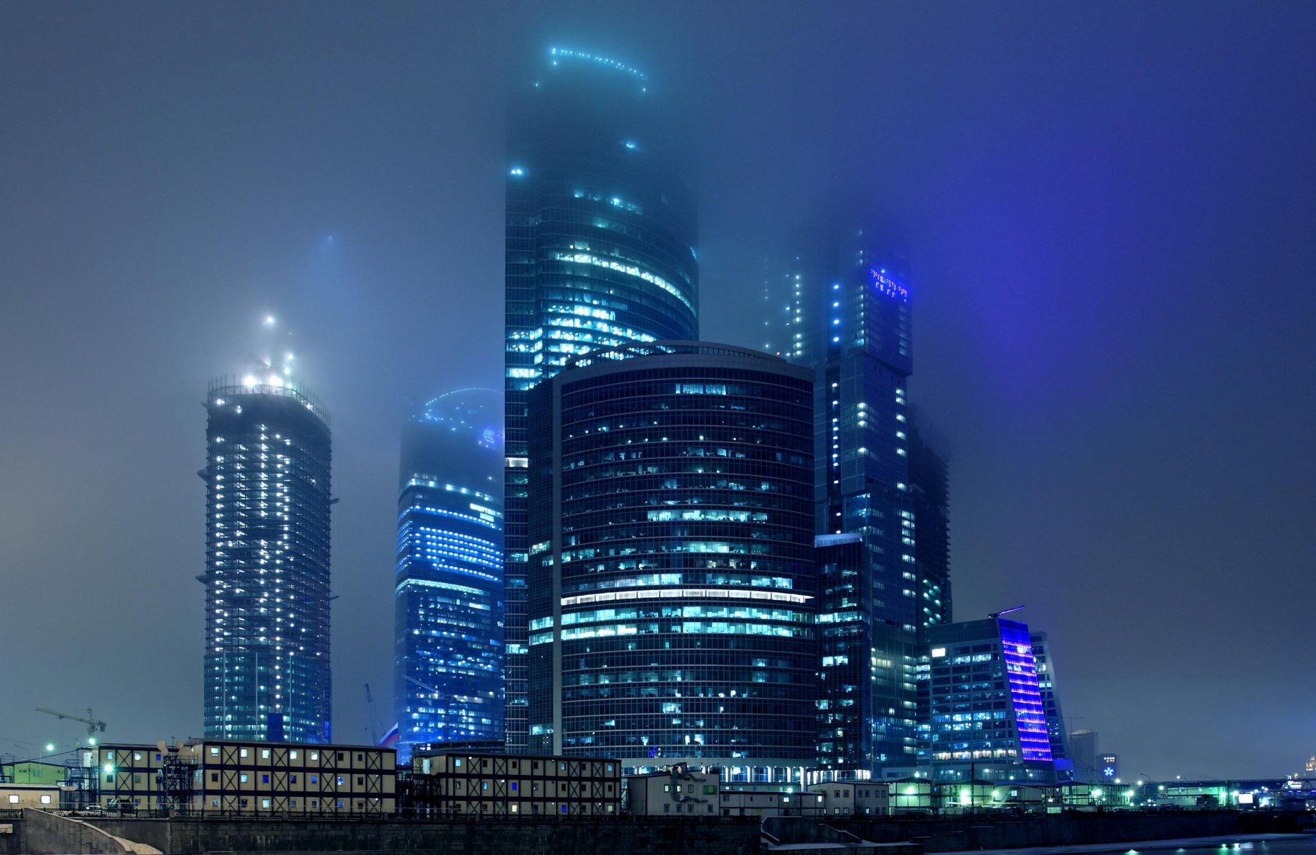 town night fog lights moscow construction complex business center moscow city skyscraper