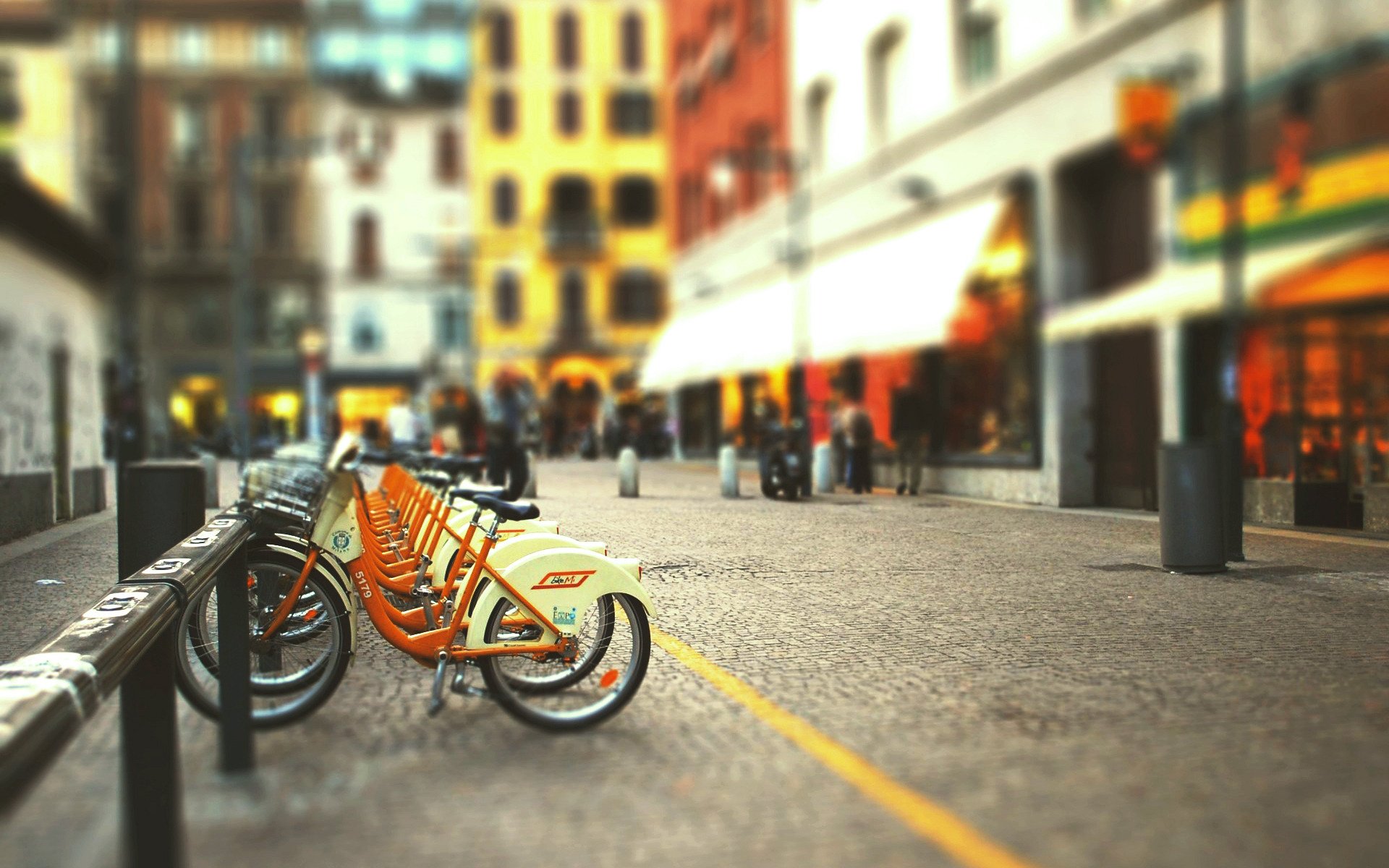 town street bike bicycle parking blurred background blur tilt-shift