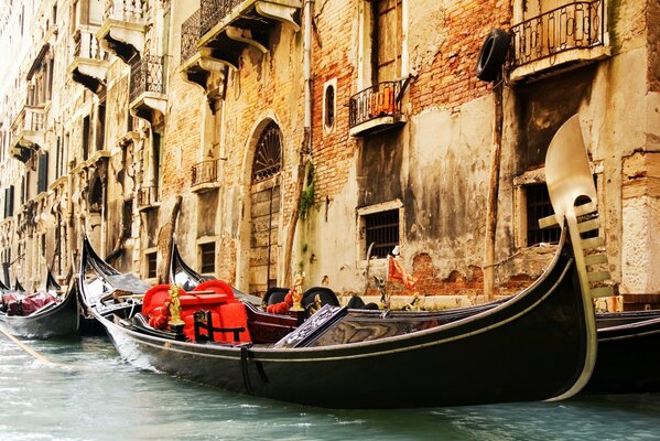 Italian gondolas sailing through Venice