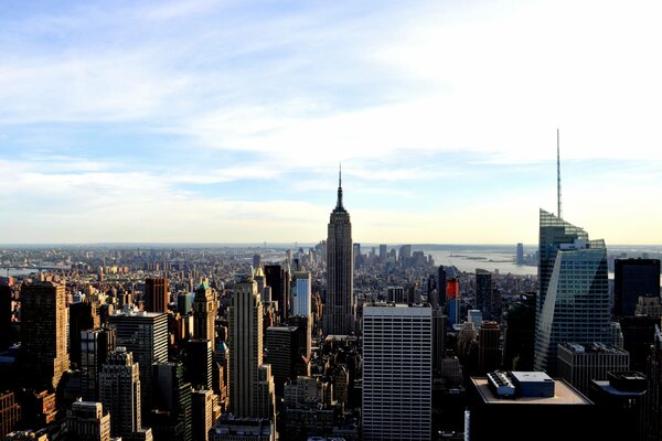 New York, USA. View of the city from above, high-rise buildings against the sky, water