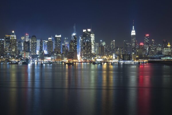 New York City night lights, river, night city