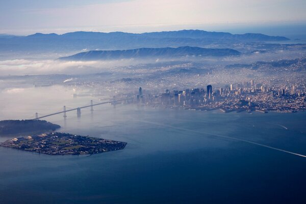 The bridge across the Bay in America in the fog