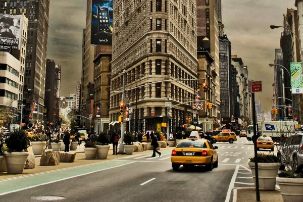 A taxi takes me somewhere along the streets of New York