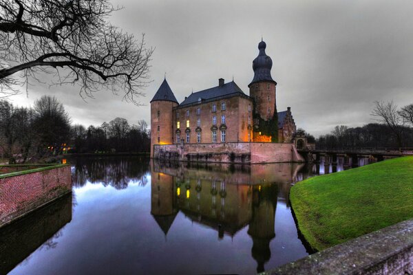Reflection of the castle in the pond water