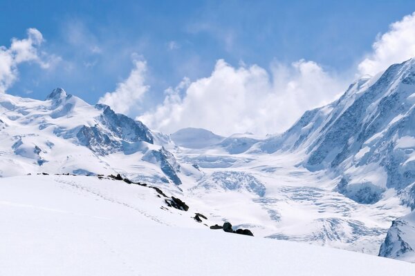 Snow-capped mountains and rocks. Landscape