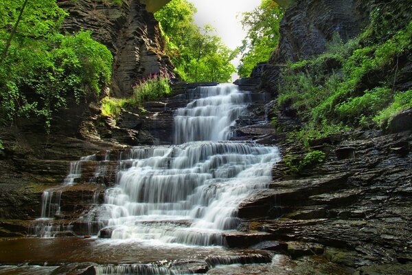 The most beautiful natural waterfall under the arch