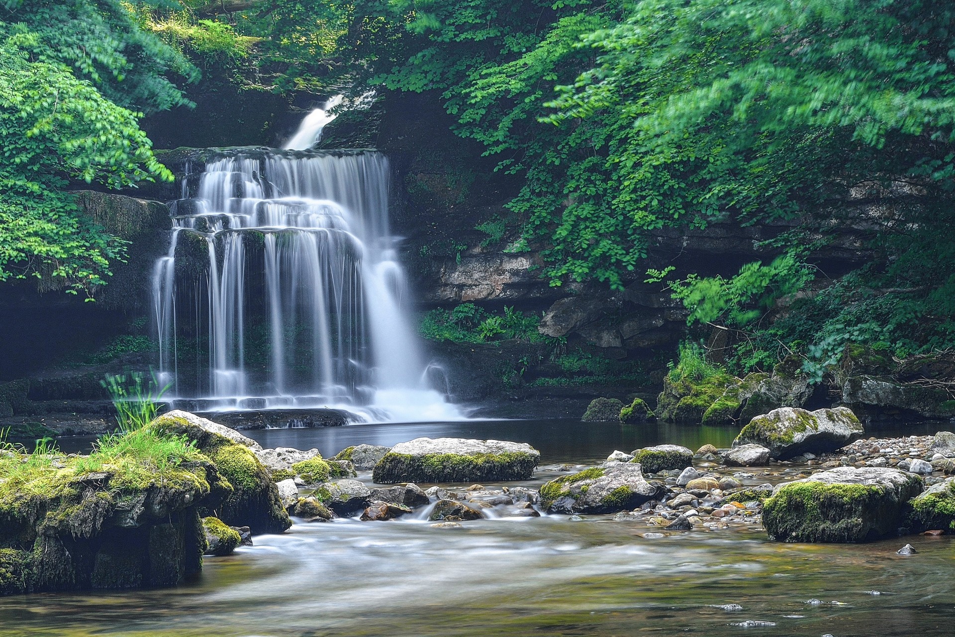 tones waterfall river nature tree rock