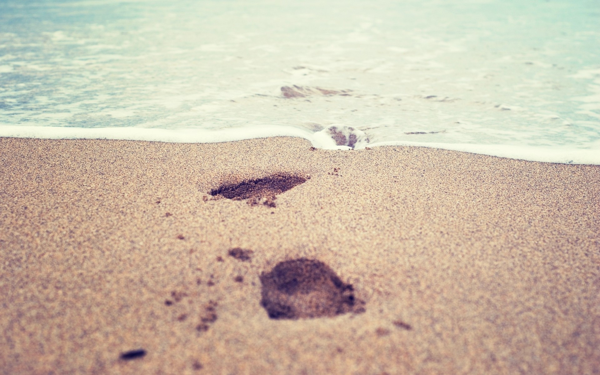 traces beach water grains close up sand