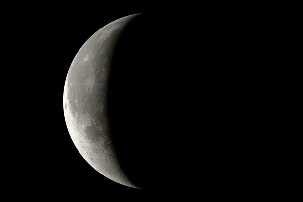 The phase of the moon. Satellite in the telescope