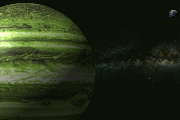 Giove verde con luna e nebulosa