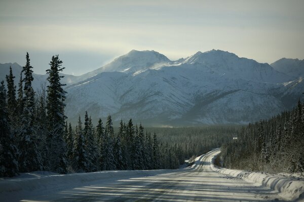 Winter road to the mountains