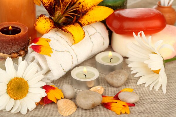 Candles and flowers. Soap and towel. Romance. Bali