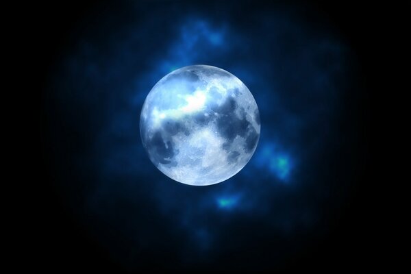A bright full moon in a light night haze