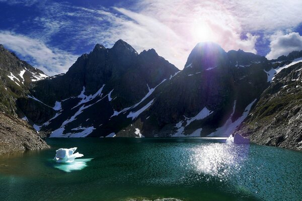 Lake on the background of mountains and rocks