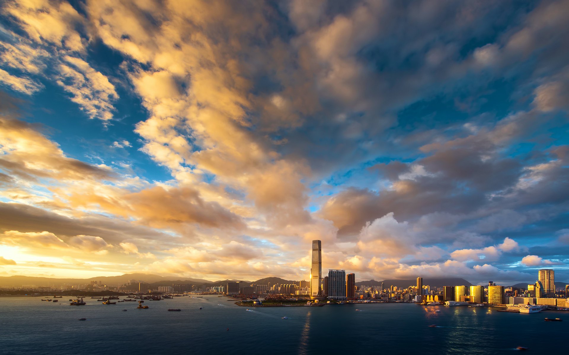 hong kong the sky sunset clouds building skyscrapers the evening