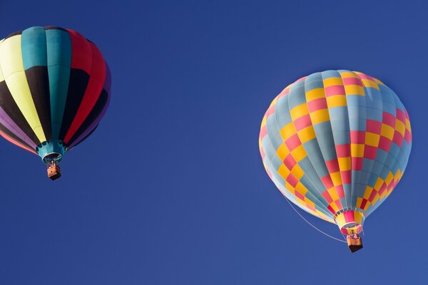 Balloons in the sky on the background