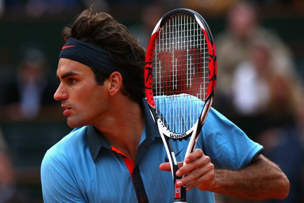 Roger Federer con una raqueta de tenis