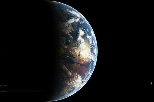 Earth from outer space with a darkened side