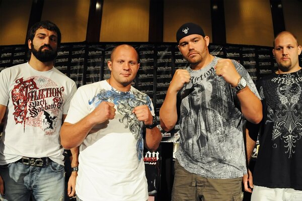 Emelianenko and other fighters in beautiful T-shirts