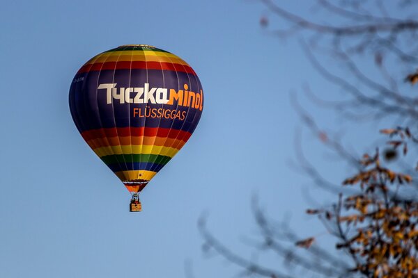 Multicolored balloon in the sky