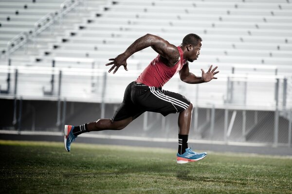 Black running man in adidas