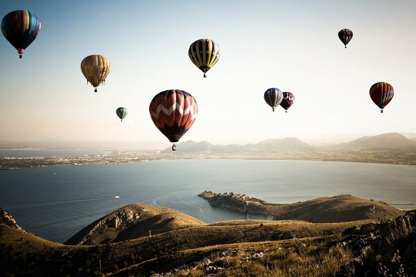 Balloons flying over the bay