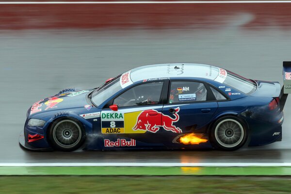 Racing car on a wet track