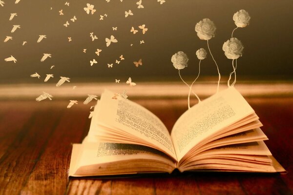 Flowers and butterflies fluttering over an open book