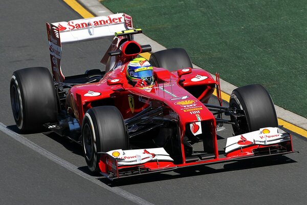 Red Ferrari sports car on the track