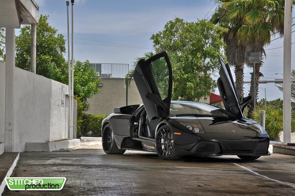 Black sports car on the road