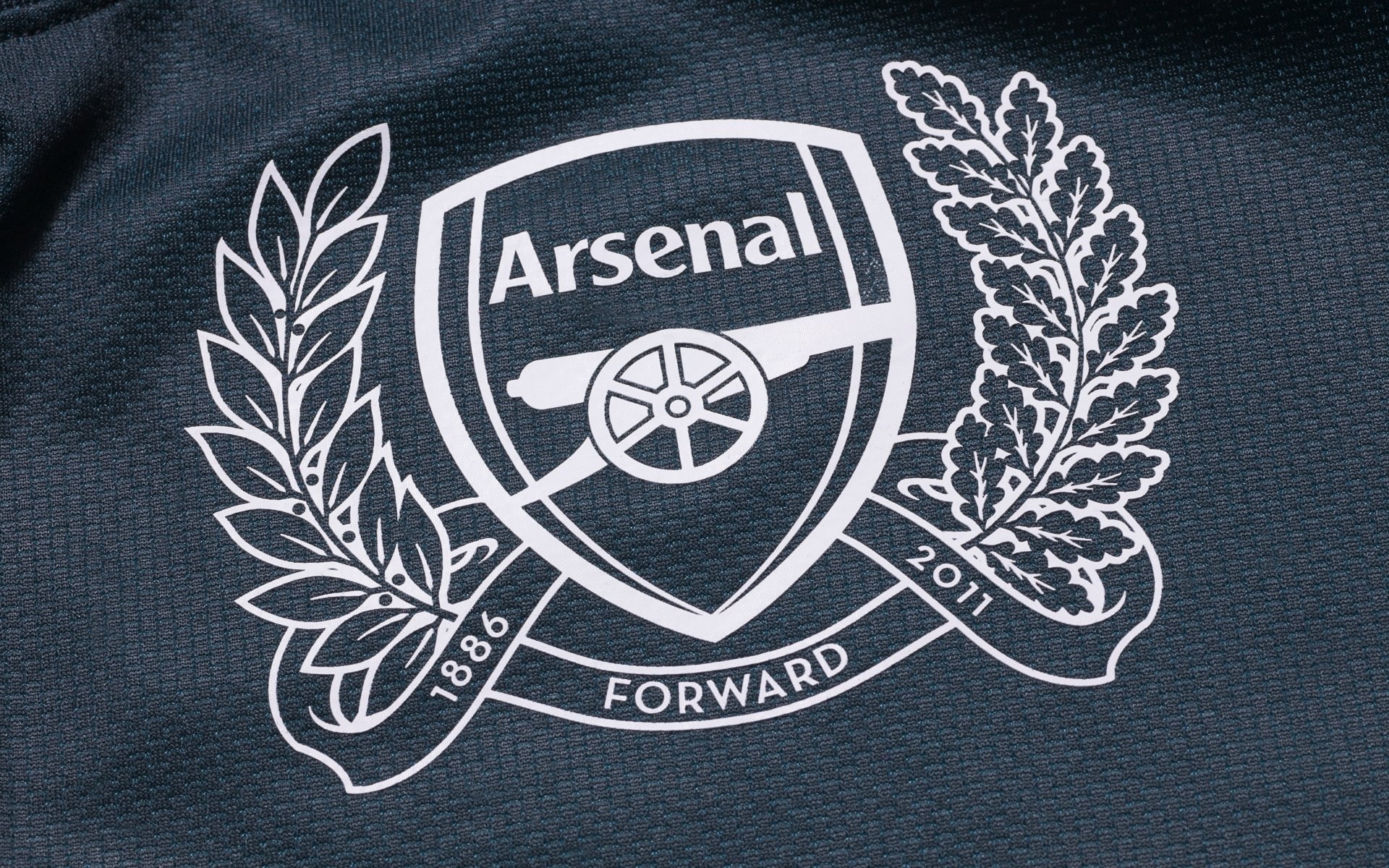 arsenal football club gunners emblem logo coat of arms fabric background