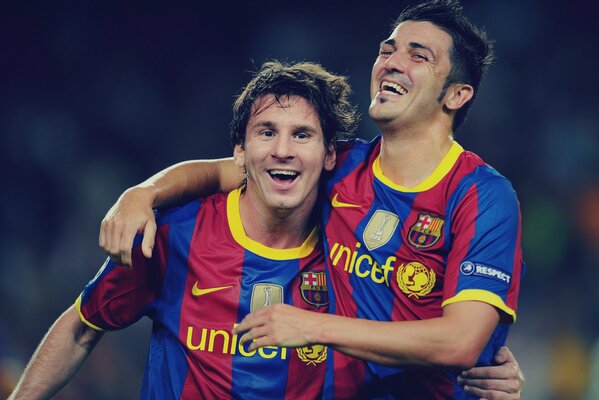 Two enthusiastic Barcelona footballers
