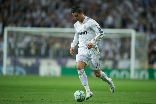 Cristiano Ronaldo with the ball on the field