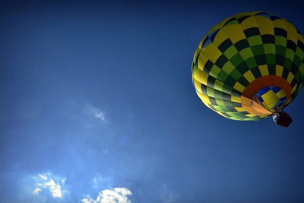 The balloon rises into the sky