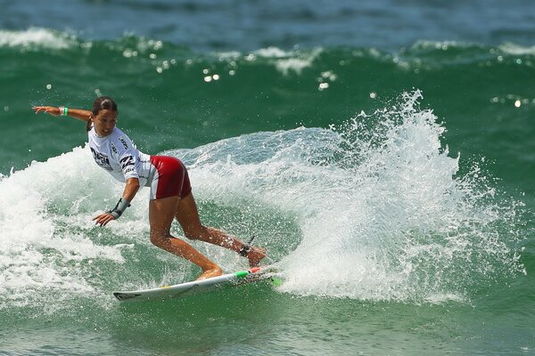 Sport girl board sea wave