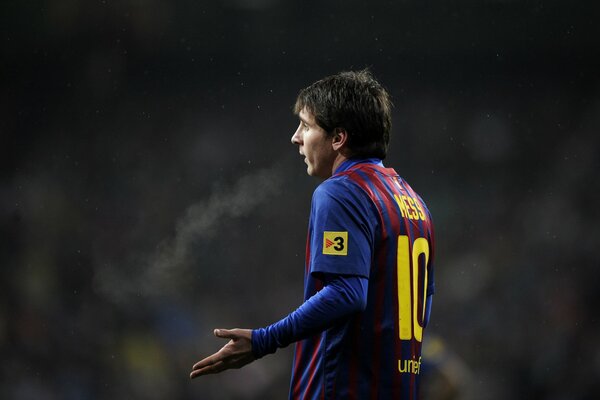 Footballer Lionel Messi on the pitch
