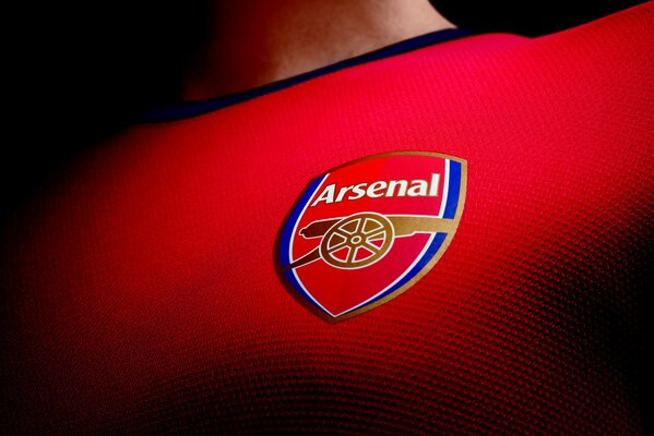 Arsenal emblem on a red background