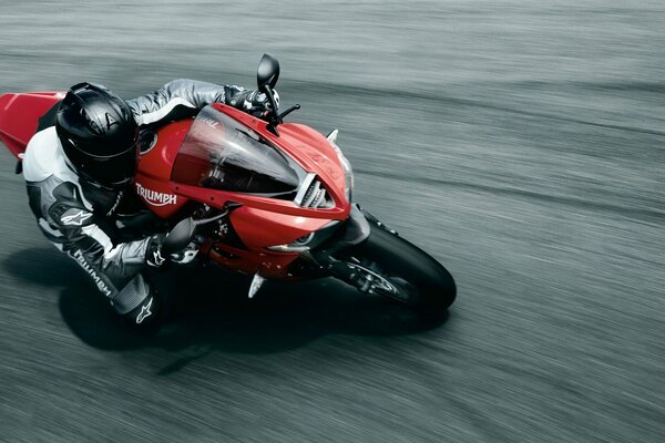 A sports motorcycle turns on the road