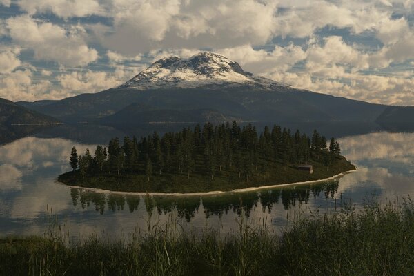 A snowy peak against a cloudy sky