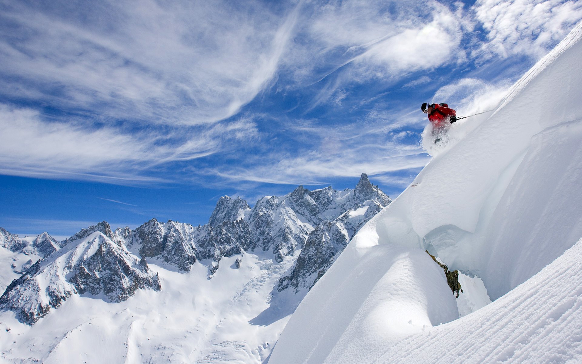 ski alpin skieur neige montagnes ciel nuages